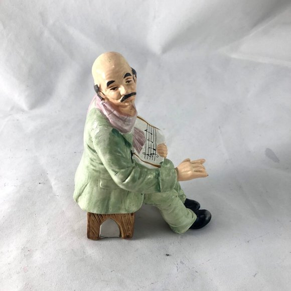 Vintage Porcelain Figurine Sitting Man in Green Suit Holding Sheet Music Hand Pa - Picture 3 of 9